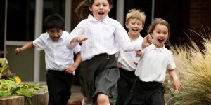 Children in a playground running